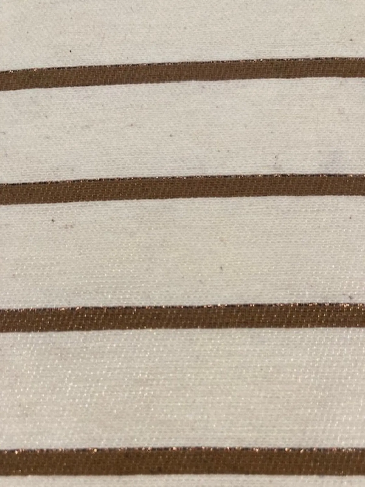 Bronze Lurex Stripe with Self Coloured Lurex detail.on Ivory Stripes run across the fabric.