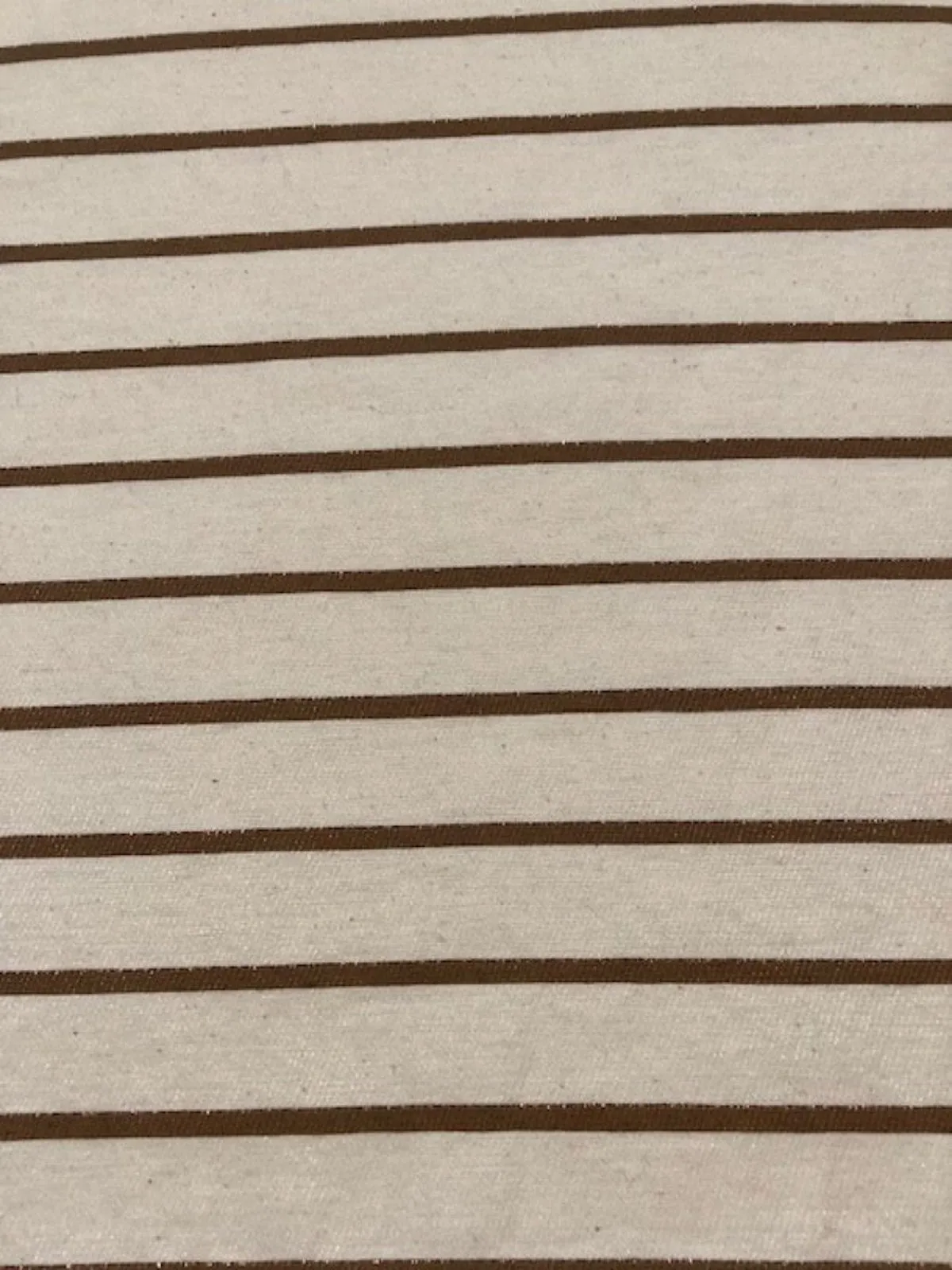 Bronze Lurex Stripe with Self Coloured Lurex detail.on Ivory Stripes run across the fabric.
