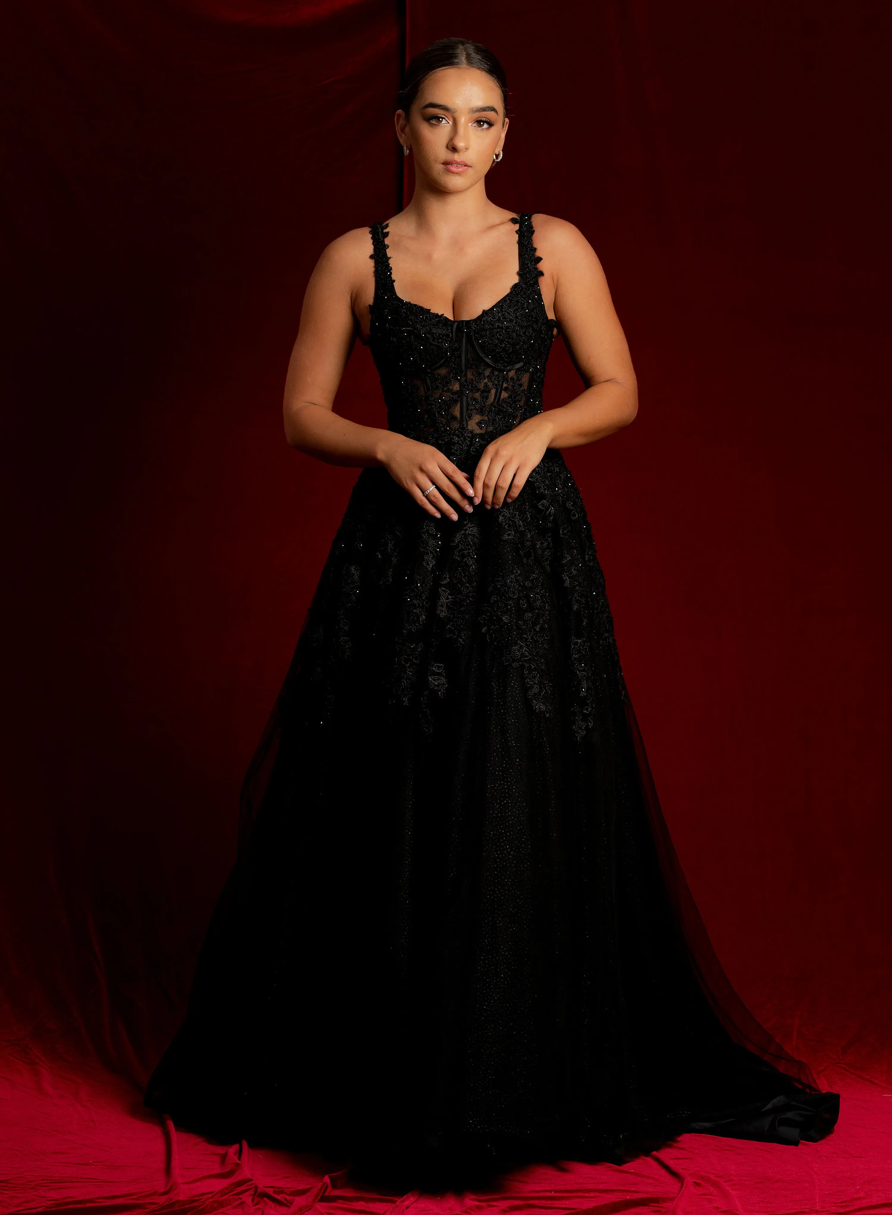 Sparkling black princess dress with square bustier top with straps for hire